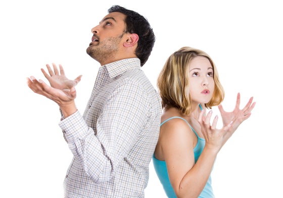 Unhappy stressed young couple having an argument